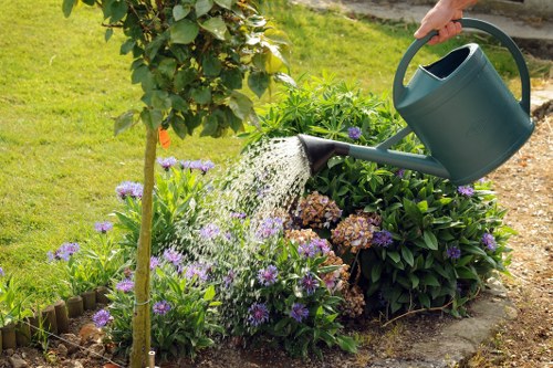 Compost bays and mulching station at a sustainable gardening site